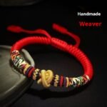 guardian-angel-red-string-bracelet-gold-wing Red string bracelet with a delicate gold angel wing charm, symbolizing divine protection, guidance, and connection to guardian angels.