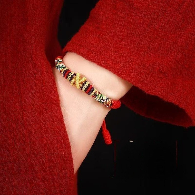 negative energy protection bracelet Braided red string bracelet in the Pura Vida style, featuring a gold infinity symbol knot for endless protection and positive energy.