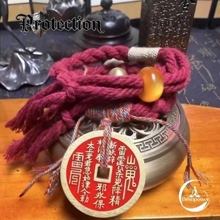 A set of protection amulets designed as a red string bracelet for the wrist. These unique protection amulets feature a detailed Mountain Spirit amulet coin for spiritual safety. Amulet of proof against detection and location, blessed by Taoist Master. Amulet protection from ghost and negative energy.